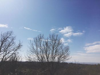 Scenic view of landscape against cloudy sky