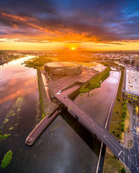 High angle view of river against sky at sunset