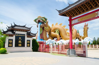 Statue of temple against sky