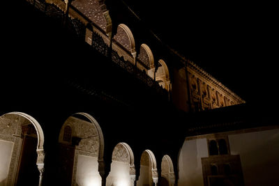 Low section of built structure at night