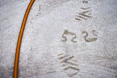 High angle view of text on road