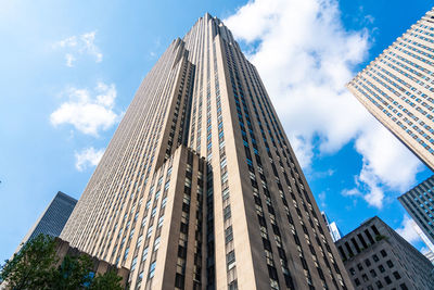 Low angle view of skyscraper against sky