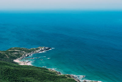 High angle view of sea and mountains