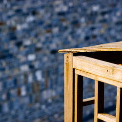 Close-up of wood against lake