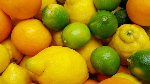 Full frame shot of oranges in market