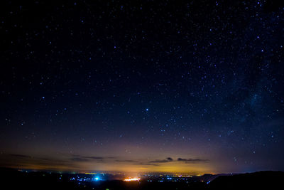 Scenic view of star field against sky at night