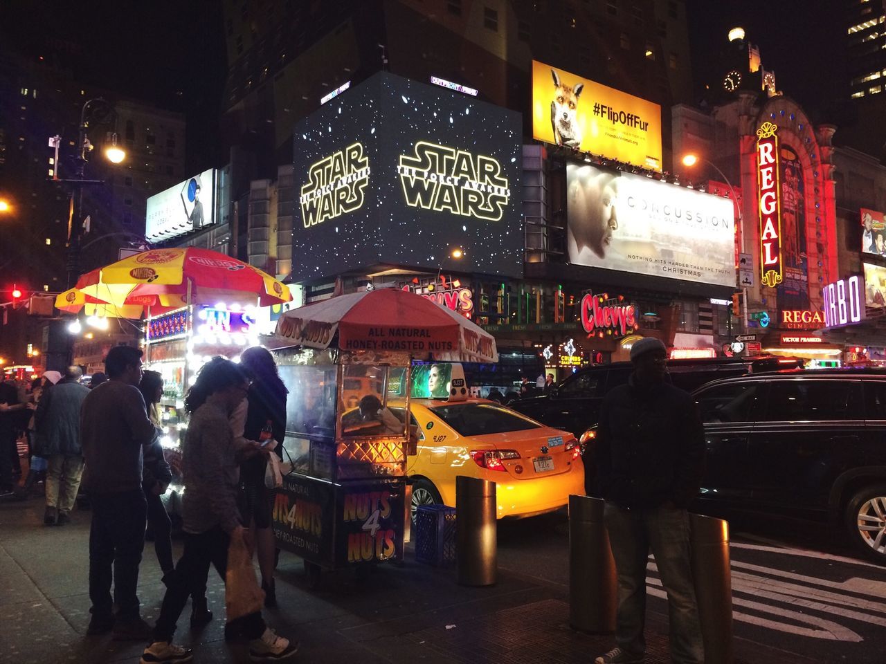 illuminated, night, text, communication, western script, city, street, men, architecture, building exterior, built structure, city life, non-western script, lifestyles, person, information sign, sign, transportation, walking