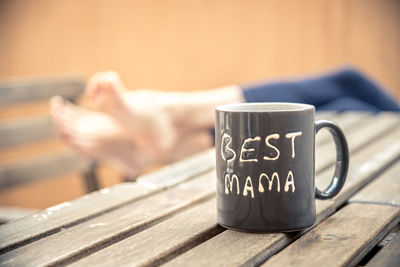 Close-up of coffee cup on table