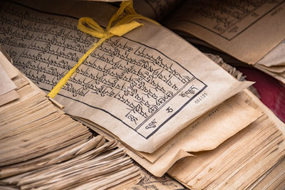 Printed sheets of tibetan abugida script prayer verses at kumbum monastery, xining, china