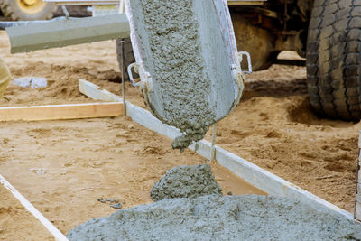 Close-up of rice on sand