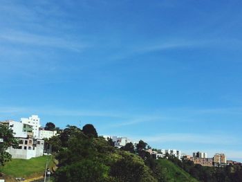 Buildings against blue sky and clouds