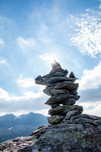 Stack of rocks against sky