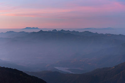 Scenic view of mountains against sky during sunset