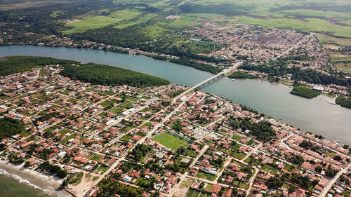 High angle view of river amidst buildings in city