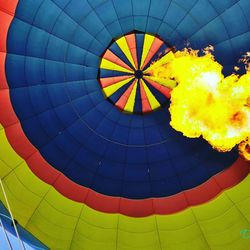 Low angle view of multi colored hot air balloon