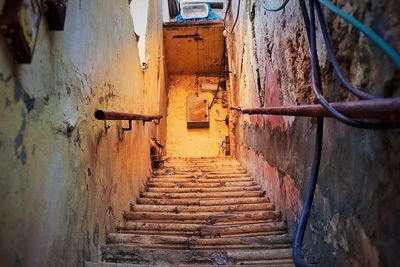Narrow stairs along buildings