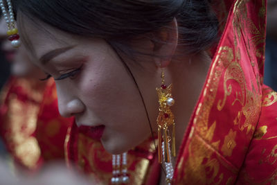 Close-up of woman with red hair