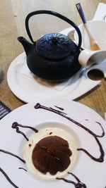 High angle view of coffee cup on table