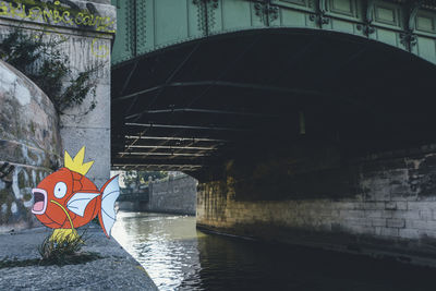 View of bridge over canal in tunnel