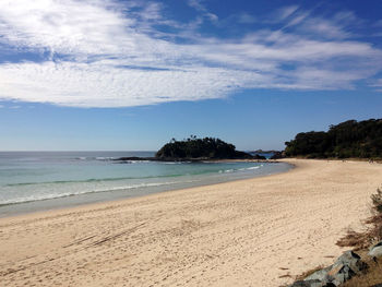 Scenic view of beach against sky