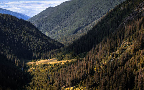 Scenic view of mountains against sky during winter