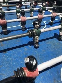 High angle view of soccer equipment on metal