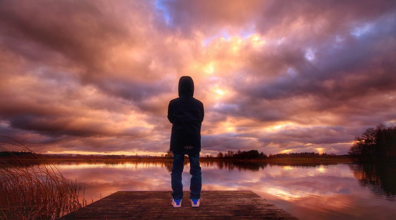 sky, water, sunset, cloud - sky, reflection, tranquility, tranquil scene, lake, cloudy, scenics, silhouette, beauty in nature, standing, weather, cloud, nature, dusk, idyllic