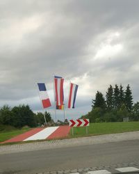 View of road against cloudy sky