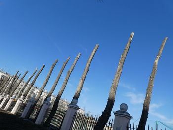 Low angle view of buildings against blue sky