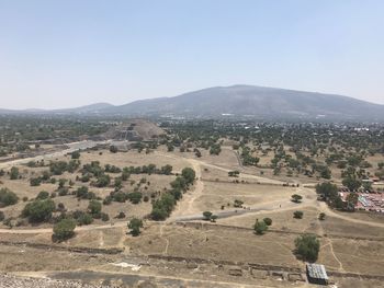 Aerial view of landscape against clear sky