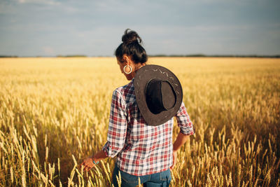 Full length of man standing in farm