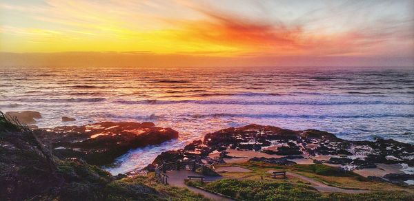 Scenic view of sea against sky during sunset