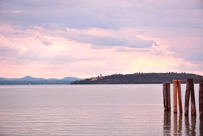 Scenic view of lake against sky during sunset