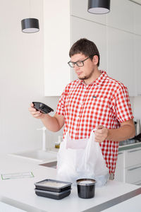 Young man using mobile phone