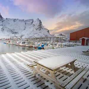 Aerial view of buildings against sky during winter