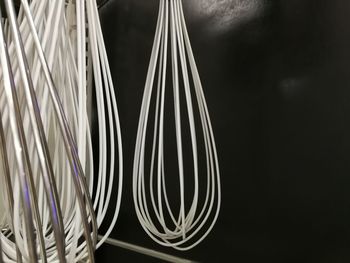 Close-up of cables against black background