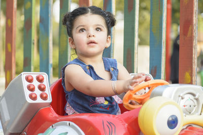 Portrait of boy playing with toy blocks