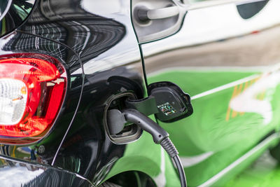 Charging battery of an electric car at charge station