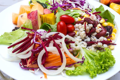 Close-up of chopped vegetables in plate