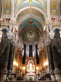 Low angle view of illuminated cathedral of building