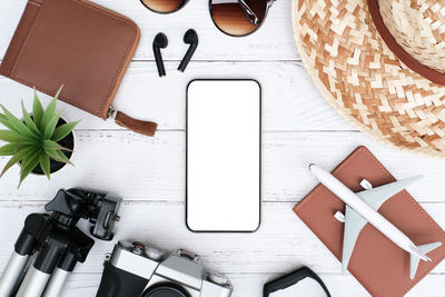High angle view of smart phone on table