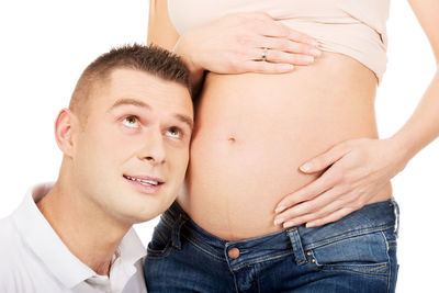 Midsection of couple with hands