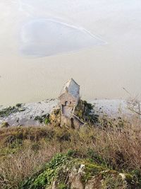 High angle view of old building at riverbank