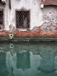 Abandoned built structure with reflection