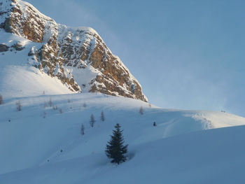 Scenic view of snowcapped mountain against sky