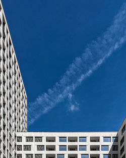 Low angle view of building against blue sky