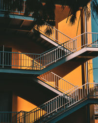 Low angle view of staircase at sunset