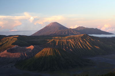 View of volcanic mountain during sunset