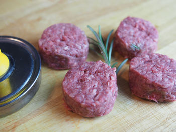 Close-up of minced meat on wooden table