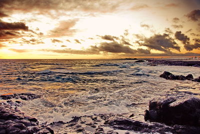 Scenic view of sea against sky during sunset